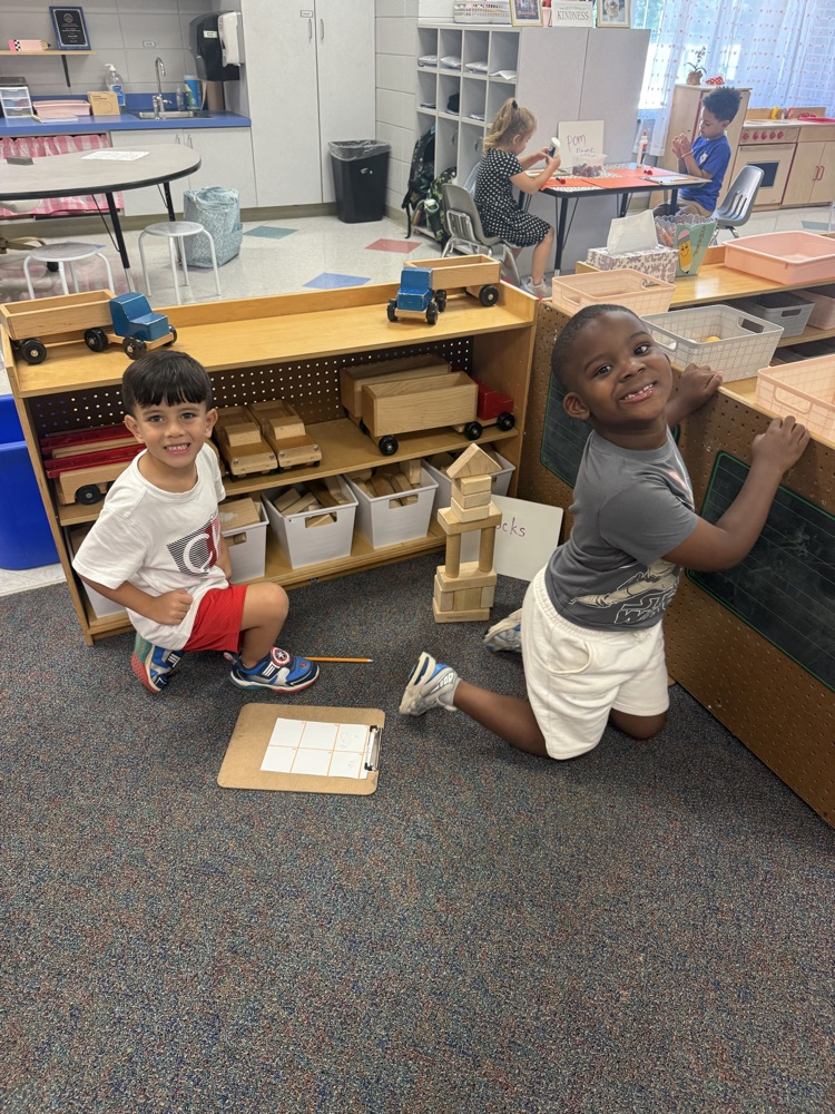 students working in their math stations to learn numbers