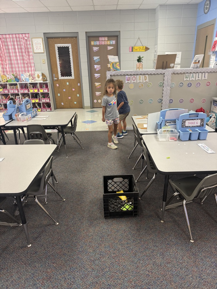 students working in their math stations to learn numbers