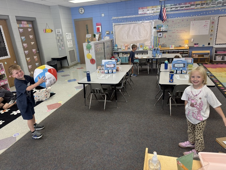 students working in their math stations to learn numbers