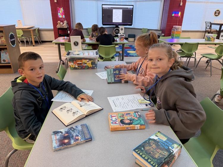 students writing at tables