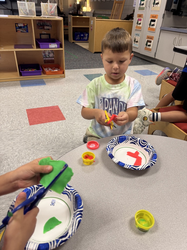 K4 students working on fine motor skills