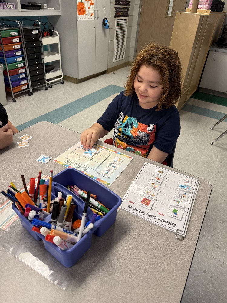 students playing tic tac toe