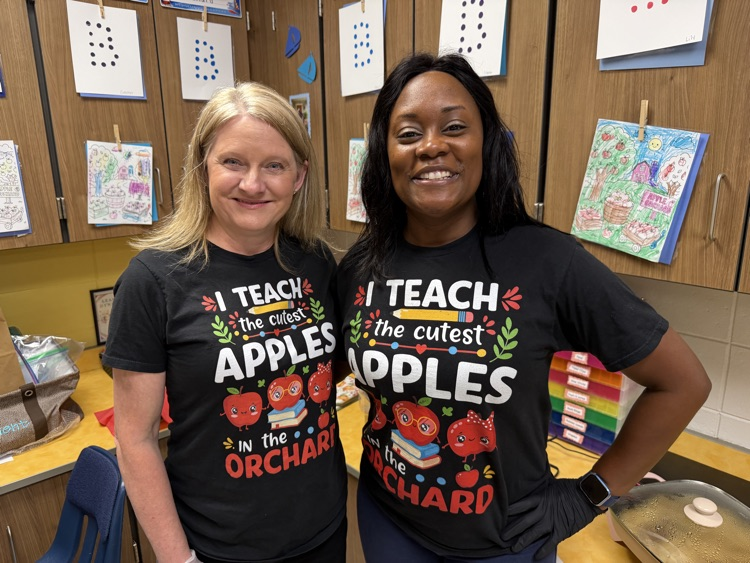 teachers with apple shirts 