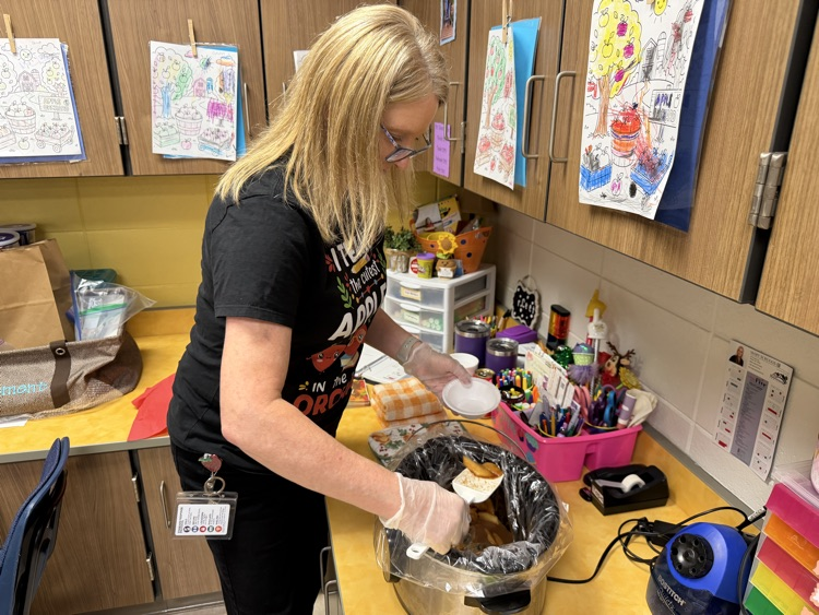 teacher cooking apples
