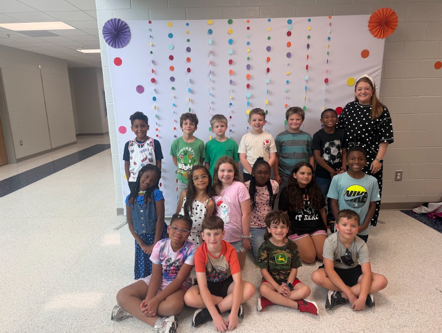 This image shows students participating in activities for Dot Day.