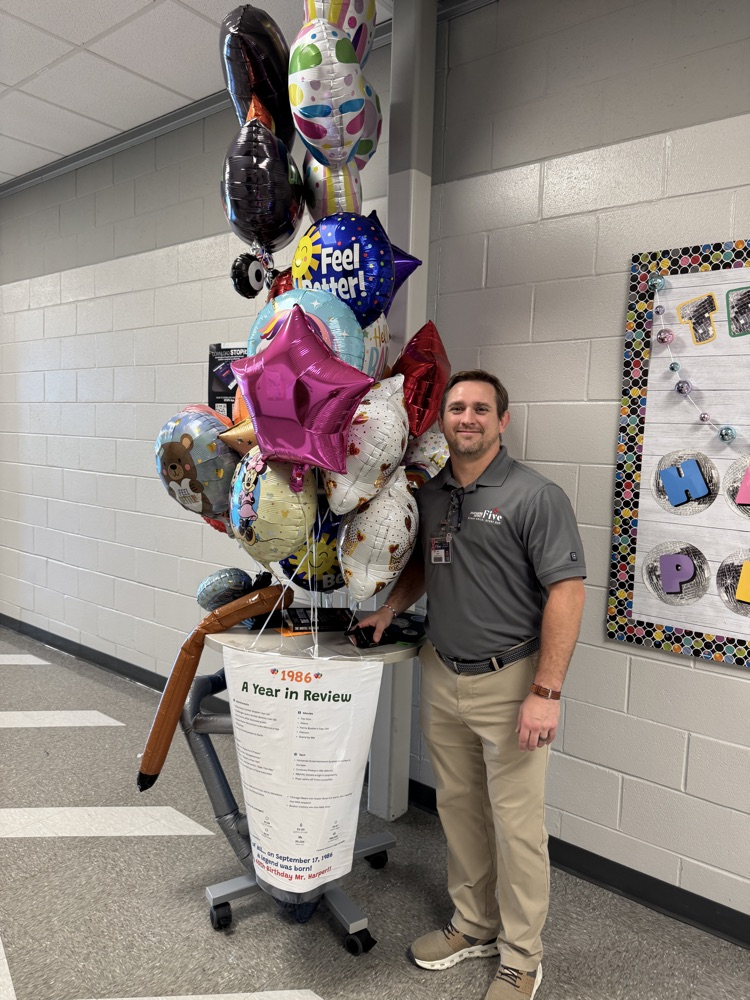 Mr Harper with balloons