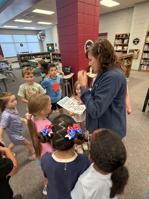 students finding and reading clues