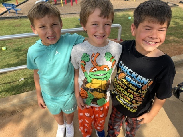students in pjs on the playground