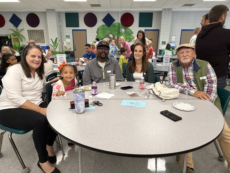 students and parents at pinning ceremony