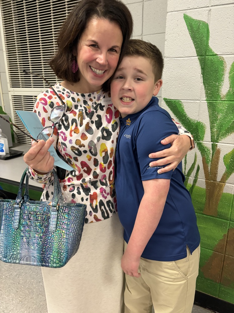students and parents at pinning ceremony