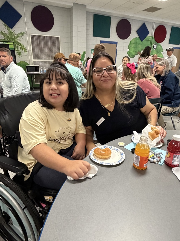 students and parents at pinning ceremony