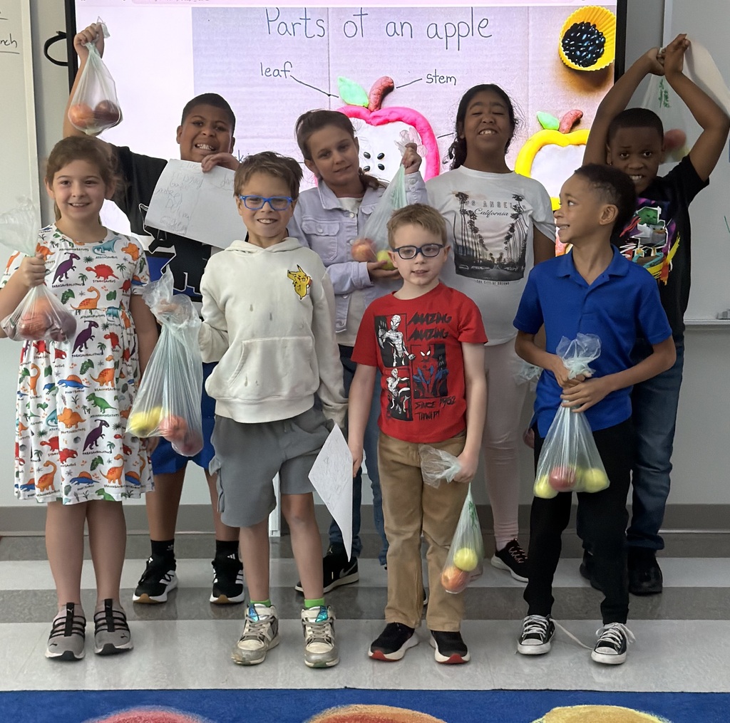 Mrs. Noble's class poses after their apple dissection lesson.