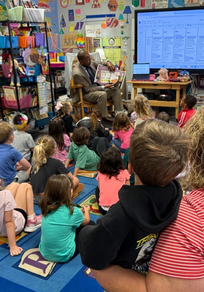 dr gary reading to students 