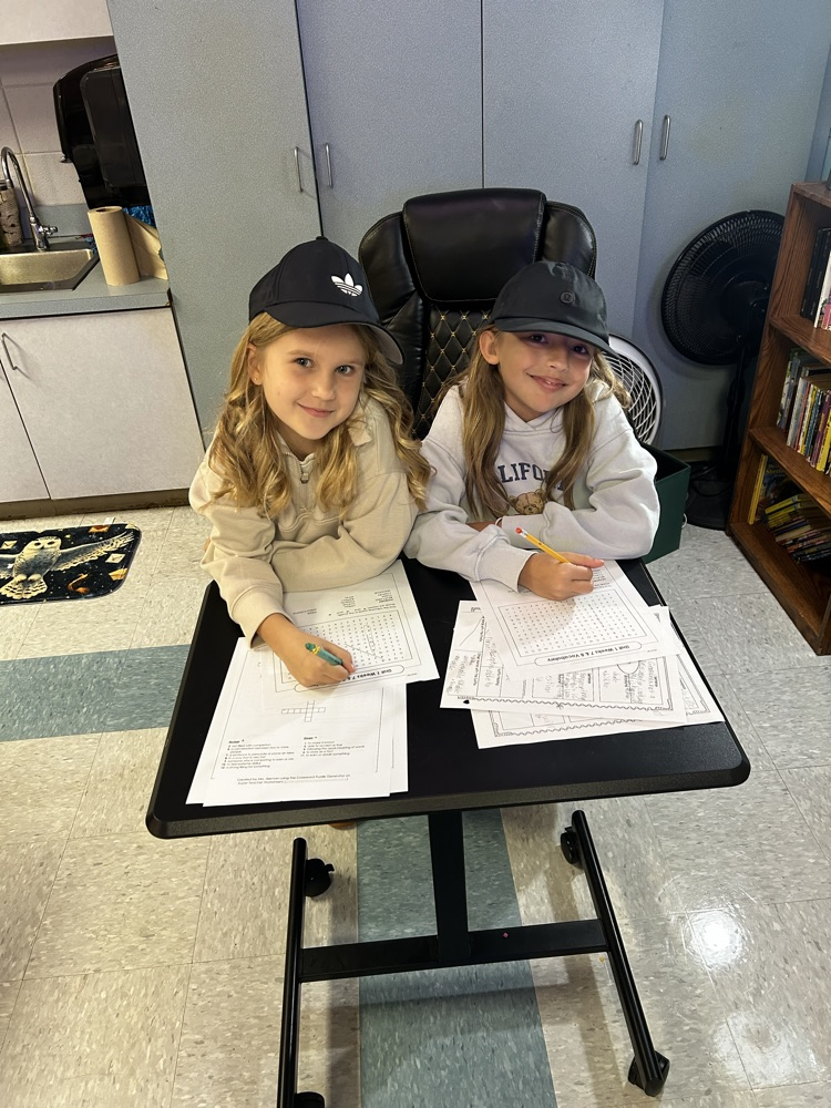 third grade students working in the classroom