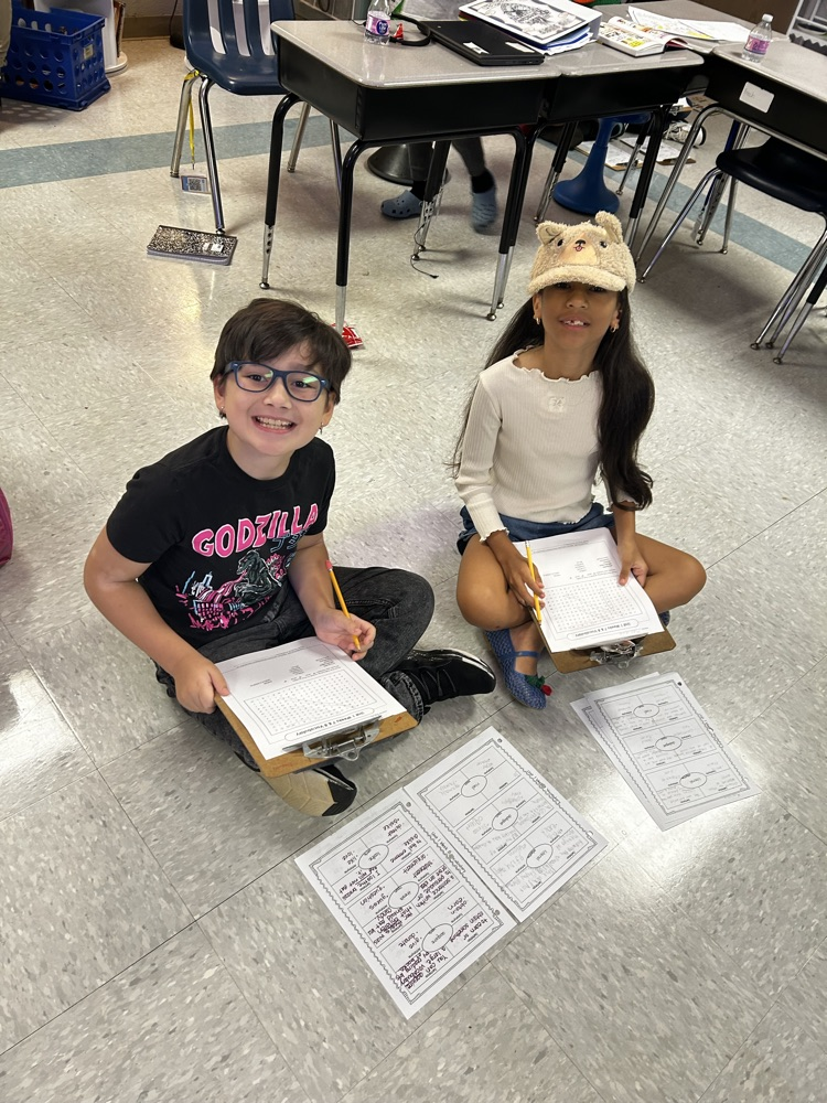 third grade students working in the classroom