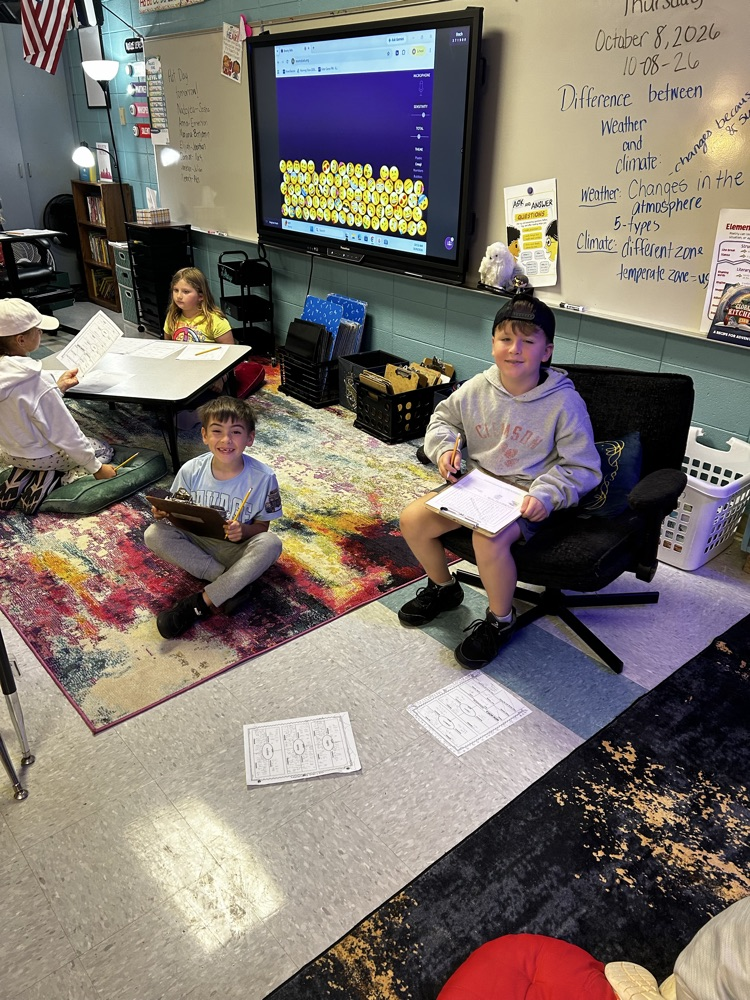 third grade students working in the classroom