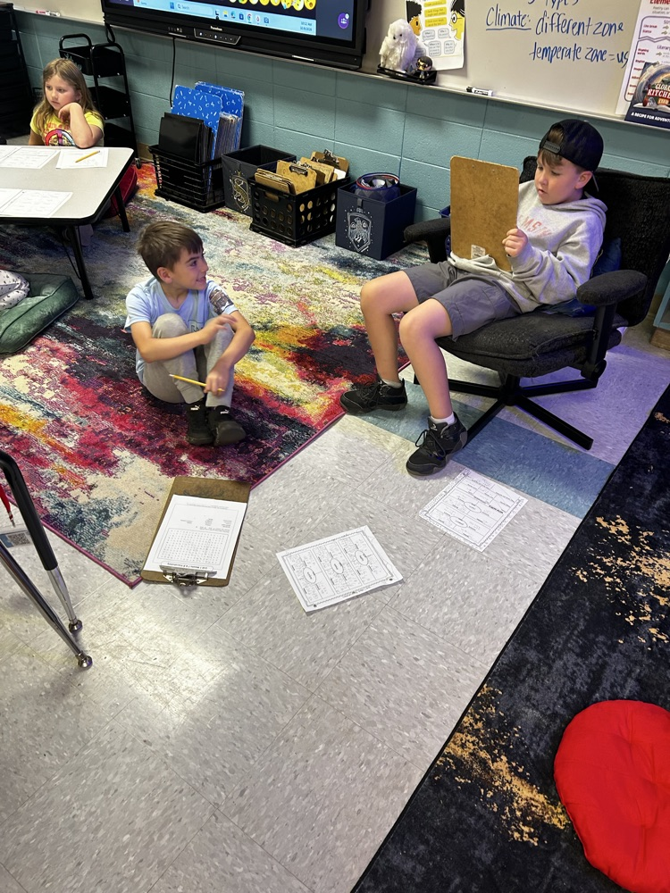 third grade students working in the classroom