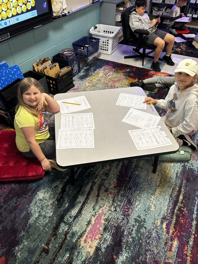 third grade students working in the classroom