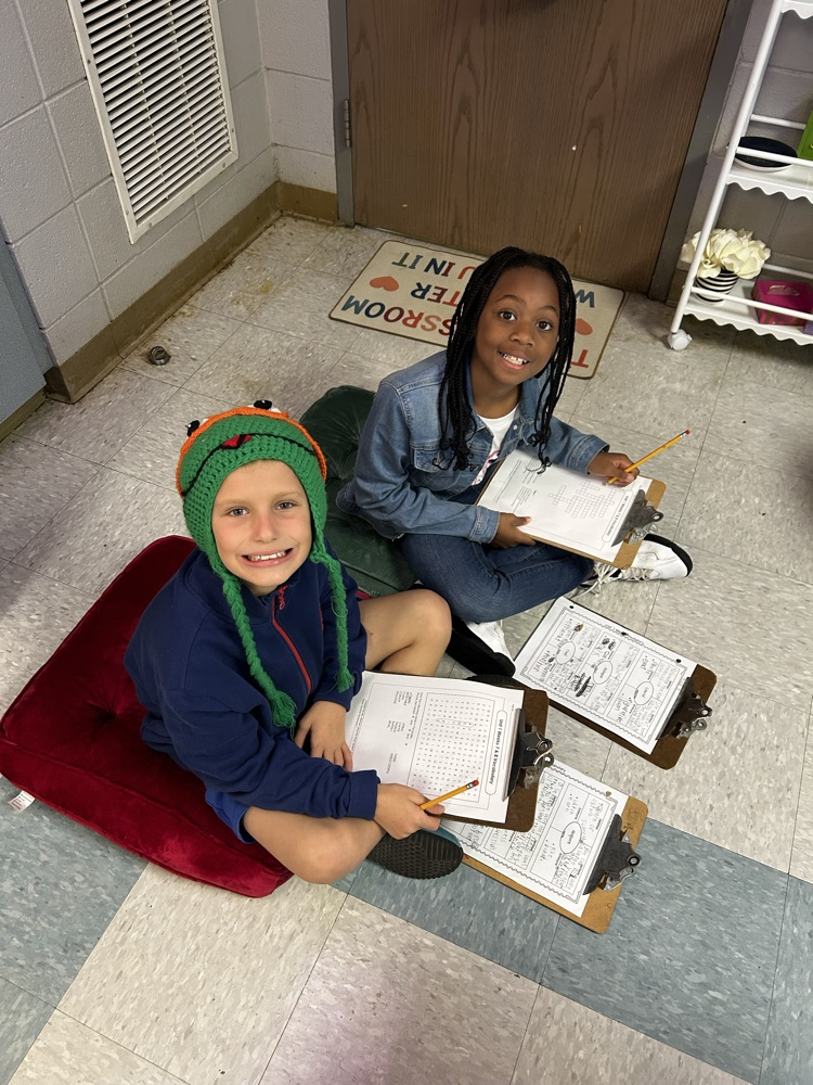 third grade students working in the classroom