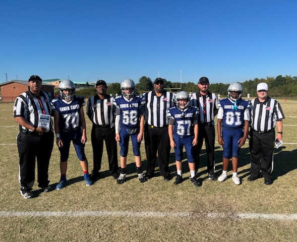 referees with athletes