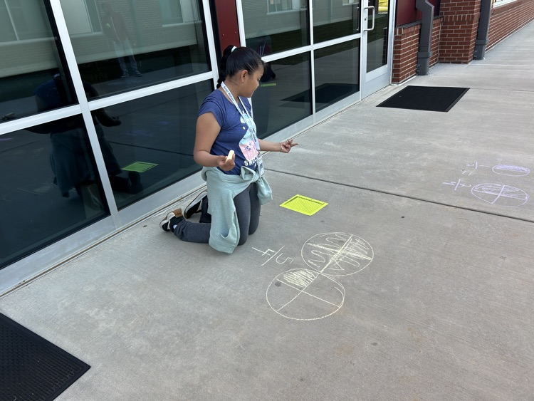kids with chalk doing math