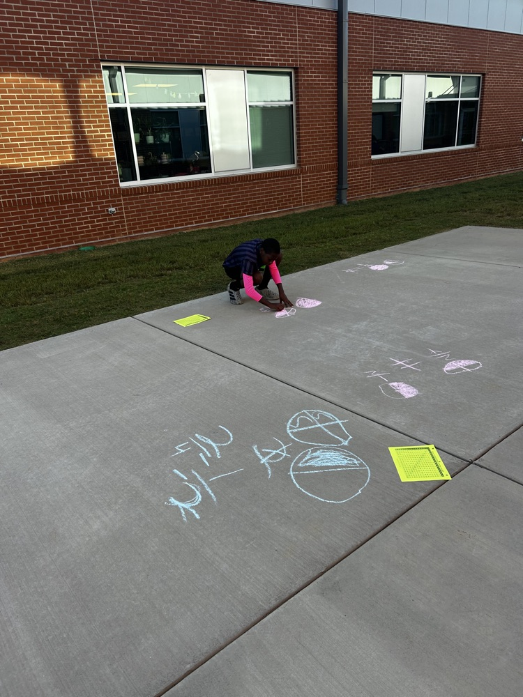 kids with chalk doing math