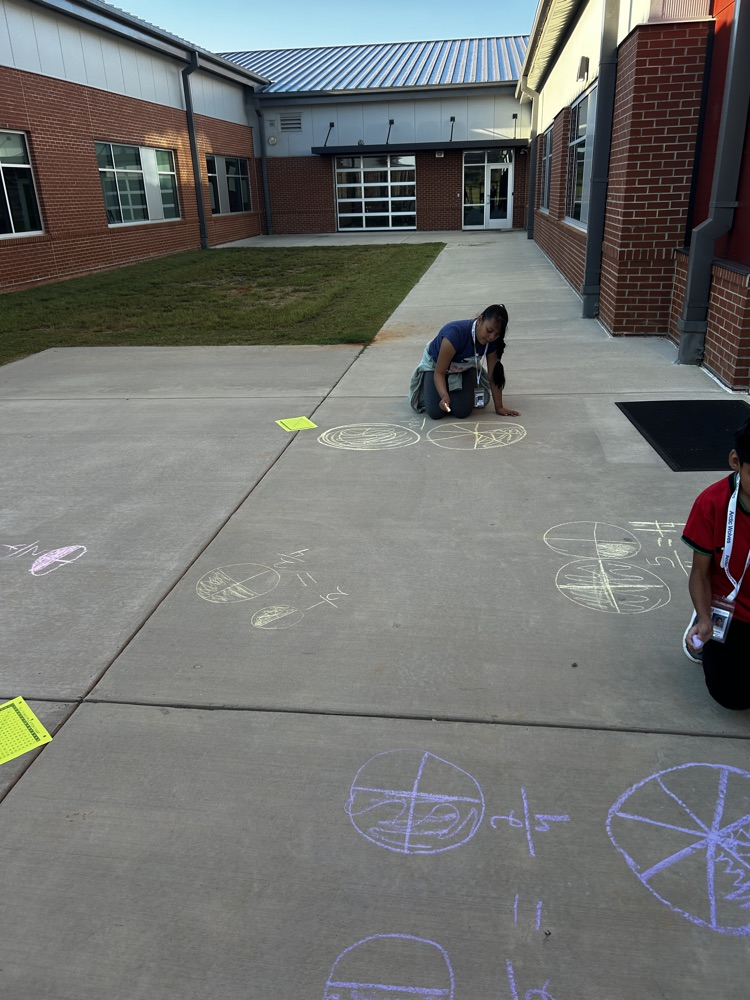 kids with chalk doing math