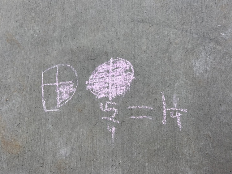 kids with chalk doing math