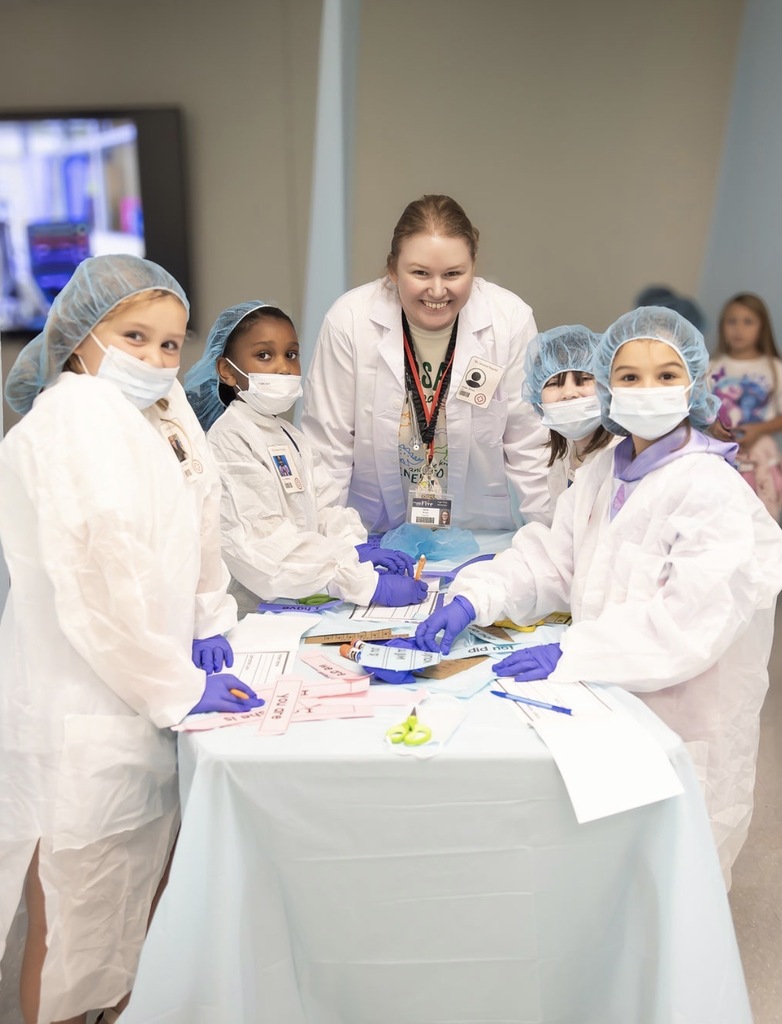 teacher and students in surgery classroom