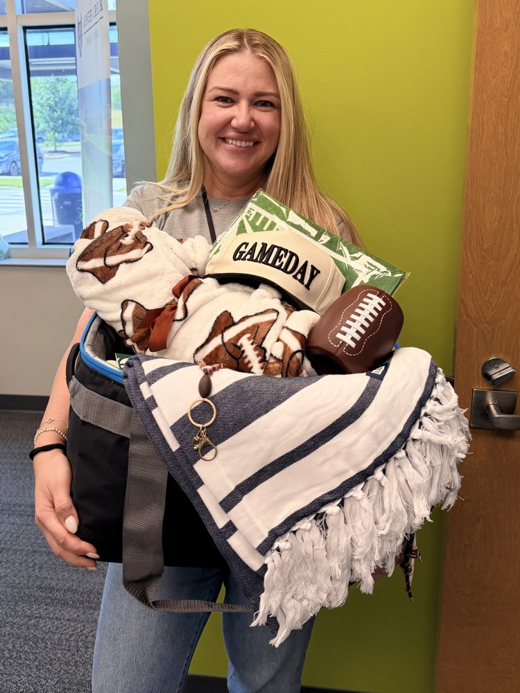 teacher with a gift basket