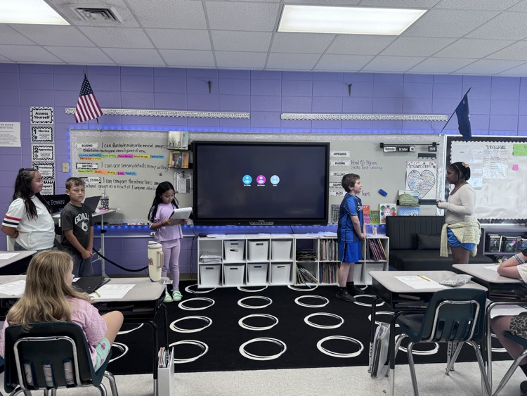 students presenting in class