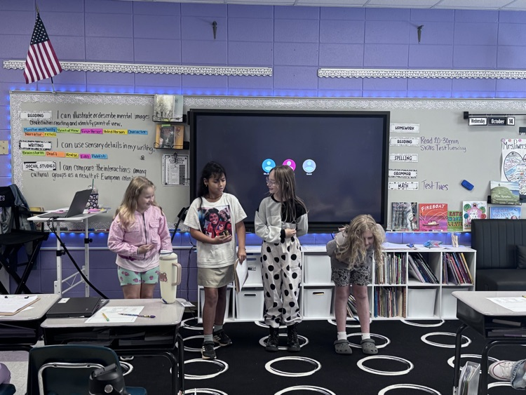 students presenting in class
