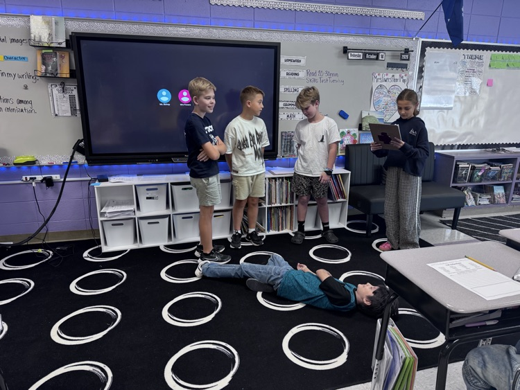 students presenting in class