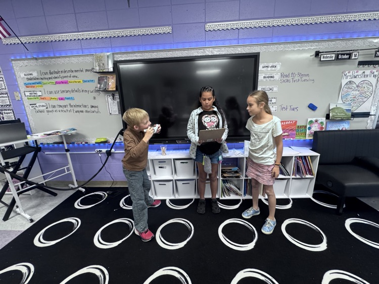 students presenting in class