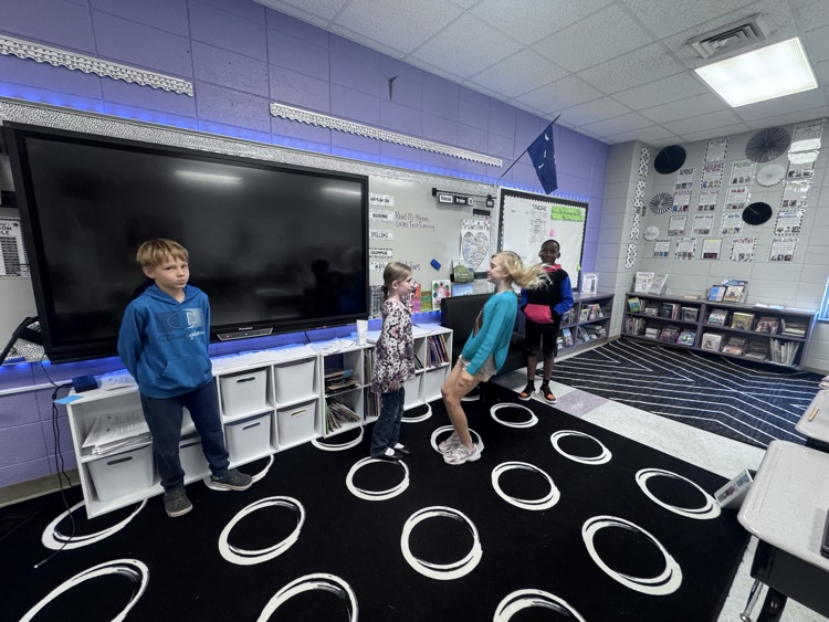 students presenting in class