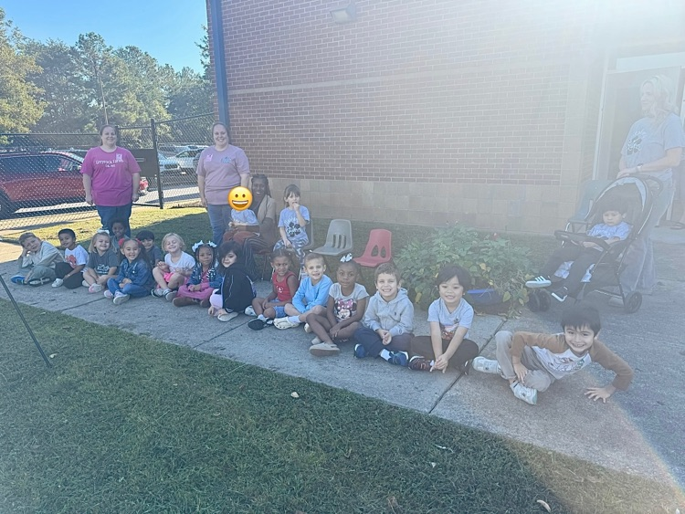 students learning about the lifecycle of pumpkins and apples