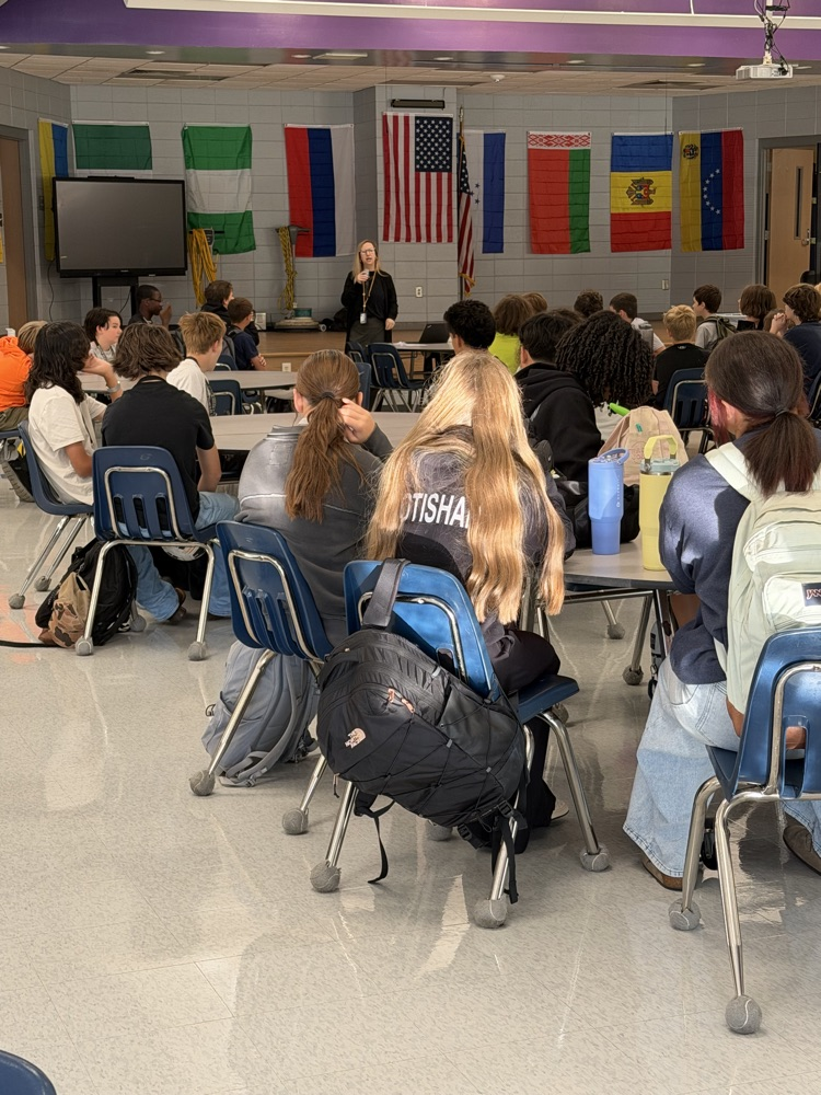 Inman talking to students