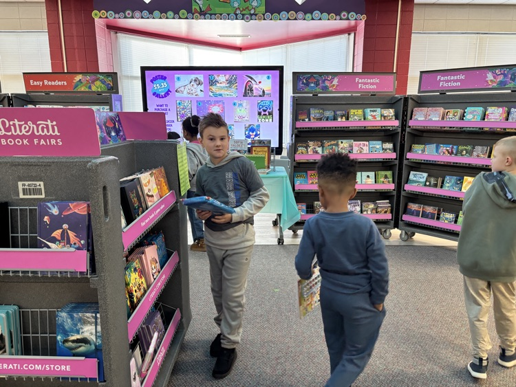 students shopping at the book fair