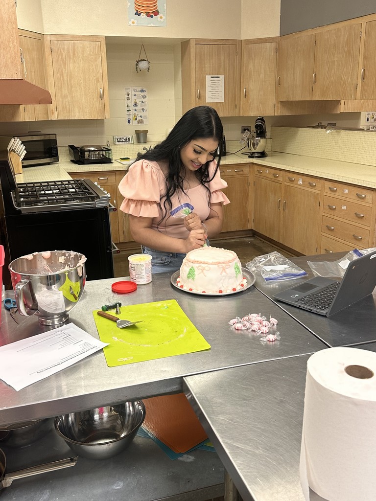 Pic of student decorating cake