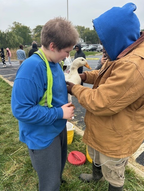 Student with a duck.