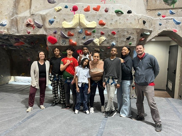Photo of Independence students and staff an rock climbing event.