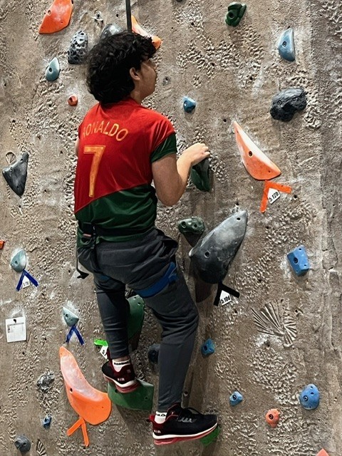 Photo of Independence student rock climbing