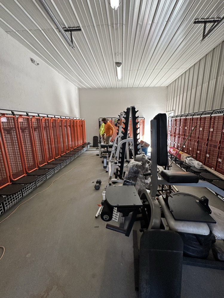  football lockers getting installed at Archambeault field 