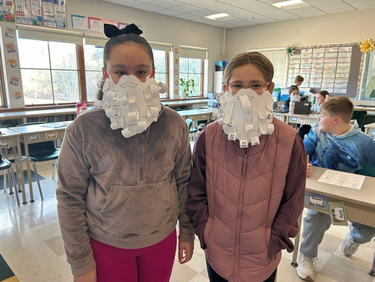 Our 5th graders have been hard at work reviewing their multiplication facts. But this wasn't just any math practice-it had a festive twist! For the final product, the students got to use their results to create their own magnificent Santa beards!