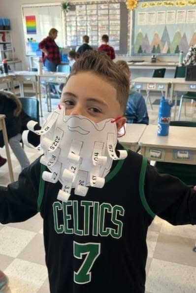 Our 5th graders have been hard at work reviewing their multiplication facts. But this wasn't just any math practice-it had a festive twist! For the final product, the students got to use their results to create their own magnificent Santa beards!