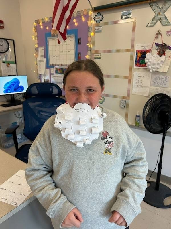 Our 5th graders have been hard at work reviewing their multiplication facts. But this wasn't just any math practice-it had a festive twist! For the final product, the students got to use their results to create their own magnificent Santa beards!