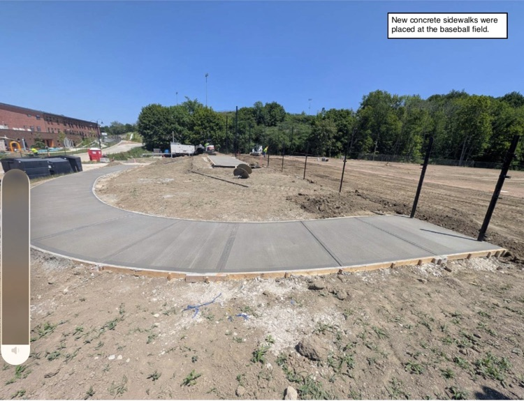 photos of the baseball field, Pre-K wing, admin & guidance spaces, auditorium, and the café/kitchen