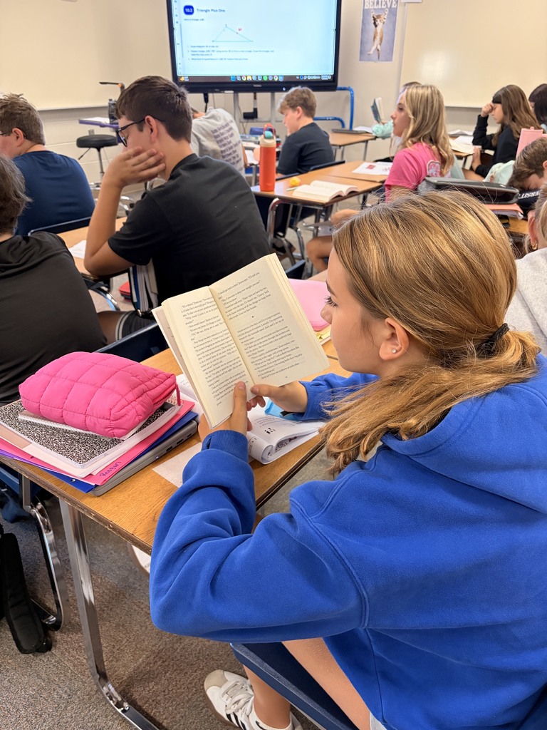 Students reading in class.
