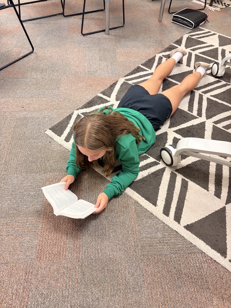 Student reading a book.