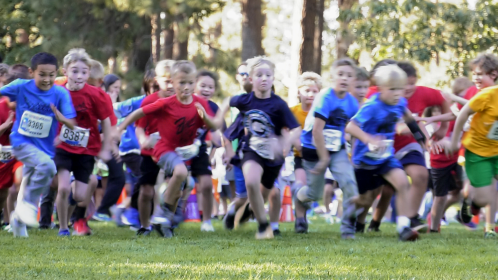 Elementary students running cross country